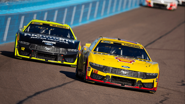 NASCAR Cup Series driver Joey Logano (22) leads teammate Ryan Blaney (12) during the NASCAR Cup Series Championship race at Phoenix Raceway.