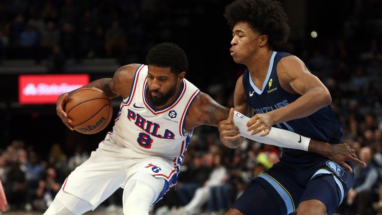 Philadelphia 76ers forward Paul George (8) drives to the basket as Memphis Grizzlies forward Jaylen Wells (0) defends during the first half at FedExForum.