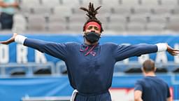 Aug 29, 2021; East Rutherford, New Jersey, USA; New England Patriots quarterback Cam Newton (1) warms up against the New York Giants before the game at MetLife Stadium.