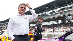 Five-time Brickyard 400 winner Jeff Gordon waits to talk with NASCAR Cup Series driver Alex Bowman (48) ahead of the Brickyard 400, Sunday, July 21, 2024, at Indianapolis Motor Speedway.