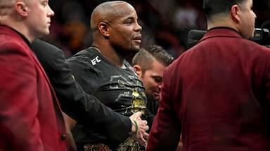 Daniel Cormier (blue gloves) celebrates beating Stipe Miocic (red gloves) during UFC 226 at T-Mobile Arena.