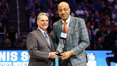 Magic CEO Alex Martins introduces former forward Dennis Scott