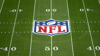 The NFL shield logo at midfield during the 2024 NFL Munich Game at Allianz Arena.