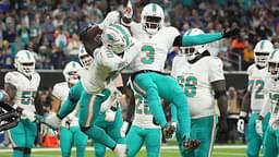 Miami Dolphins wide receiver Tyreek Hill (10) celebrates with wide receiver Odell Beckham Jr. (3) after scoring on a 1-yard touchdown reception against the Los Angeles Rams in the second half at SoFi Stadium.