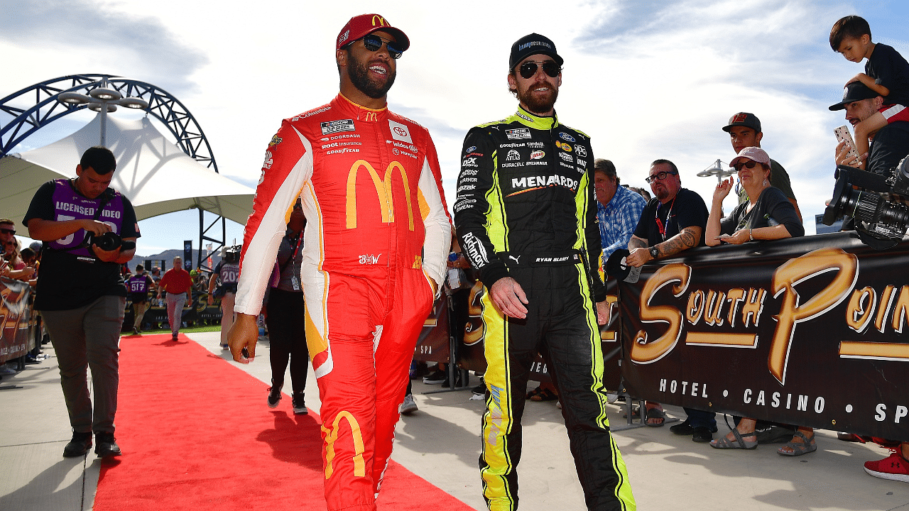 NASCAR Cup Series driver Bubba Wallace (45) and driver Ryan Blaney (12) walk the red carpet before the South Point 400 at Las Vegas Motor Speedway.