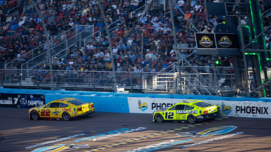 NASCAR Cup Series driver Joey Logano (22) leads Ryan Blaney (12) during the NASCAR Cup Series Championship race at Phoenix Raceway.