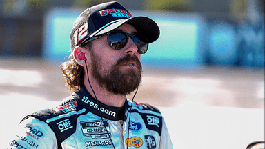 NASCAR Cup Series driver Ryan Blaney (12) watches the pole numbers during cup qualifying at Martinsville Speedway.