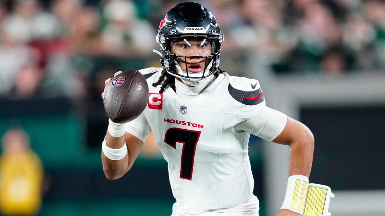 Houston Texans quarterback C.J. Stroud (7) runs with the ball in the second quarter, Thursday, October 31, 2024, in East Rutherford.