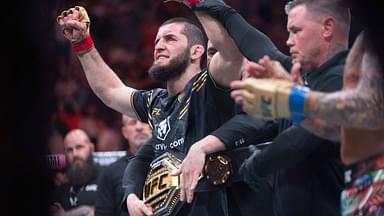 ; Islam Makhachev (red gloves) celebrates defeating Dustin Poirier (blue gloves) during UFC 302 at Prudential Center.