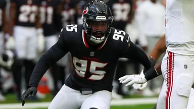 Aug 17, 2024; Houston, Texas, USA; New York Giants quarterback Daniel Jones (8) passes against Houston Texans defensive end Derek Barnett (95) rush in the first quarter at NRG Stadium.