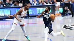 Dallas Mavericks guard Kyrie Irving (11) drives to the basket as Phoenix Suns forward Kevin Durant (35) defends during the fourth quarter at American Airlines Center.