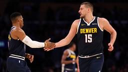 Denver Nuggets center Nikola Jokic (15) embraces guard Russell Westbrook (4) during the third quarter against the Los Angeles Lakers at Crypto.com Arena