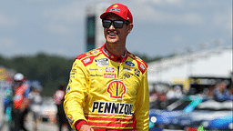 NASCAR Cup Series driver Joey Logano walks on pit road during practice and qualifying for the The Great American Getaway 400 at Pocono Raceway.