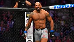 Israel Adesanya (red gloves) fights Yoel Romero (blue gloves) during UFC 248 at T-Mobile Arena.