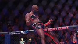 Jon Jones (red gloves) celebrates defeating Stipe Miocoic (blue gloves) in the heavyweight bout during UFC 309 at Madison Square Garden.