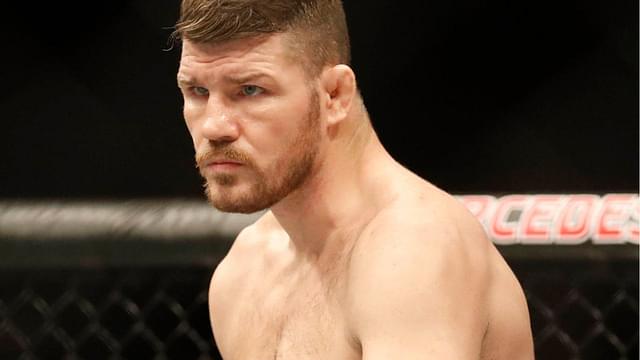 Michael Bisping (red gloves) during his fight against Kelvin Gastelum (blue gloves) during UFC Fight Night at Mercedes-Benz Arena.