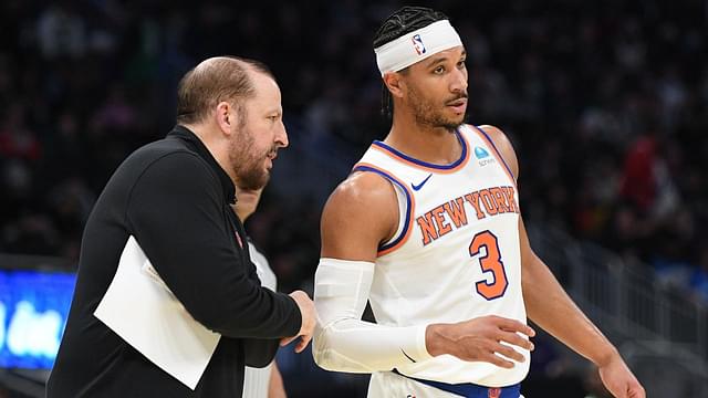 New York Knicks coach Tom Thibodeau talks with New York Knicks guard Josh Hart (3) on the sideline against the Milwaukee Bucks in the first half at Fiserv Forum.