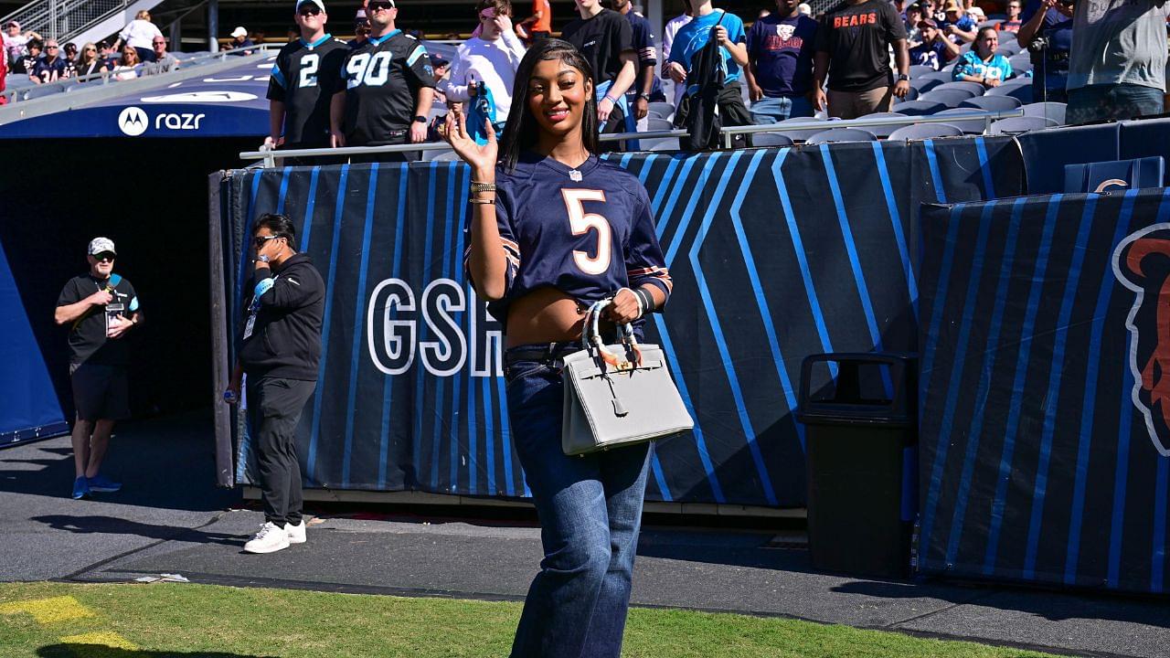 Chicago Sky forward Angel Reese poses for a photo before the game between the Chicago Bears and Carolina Panthers at Soldier Field.