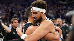 Mavericks guard Klay Thompson (31) hugs Golden State Warriors guard Stephen Curry (30) after a game at the Chase Center.