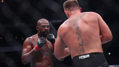 Jon Jones (red gloves) fights Stipe Miocoic (blue gloves) in the heavyweight bout during UFC 309 at Madison Square Garden.