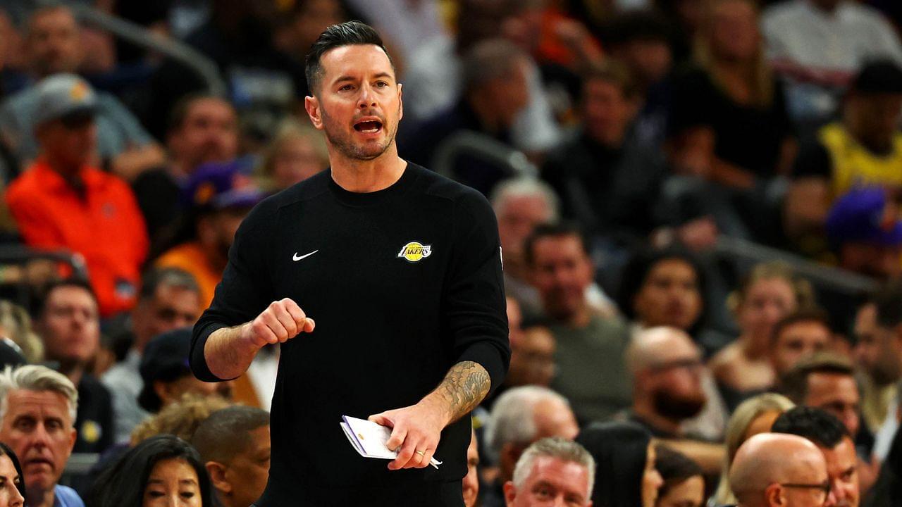 Los Angeles Lakers head coach JJ Redick talks to his team during the half of the game against the Phoenix Suns at Footprint Center.