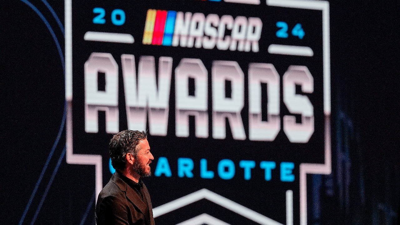 NASCAR Cup Series driver Martin Truex Jr. (19) listens to comments on his retirement during the NASCAR Awards Banquet at Charlotte Convention Center.