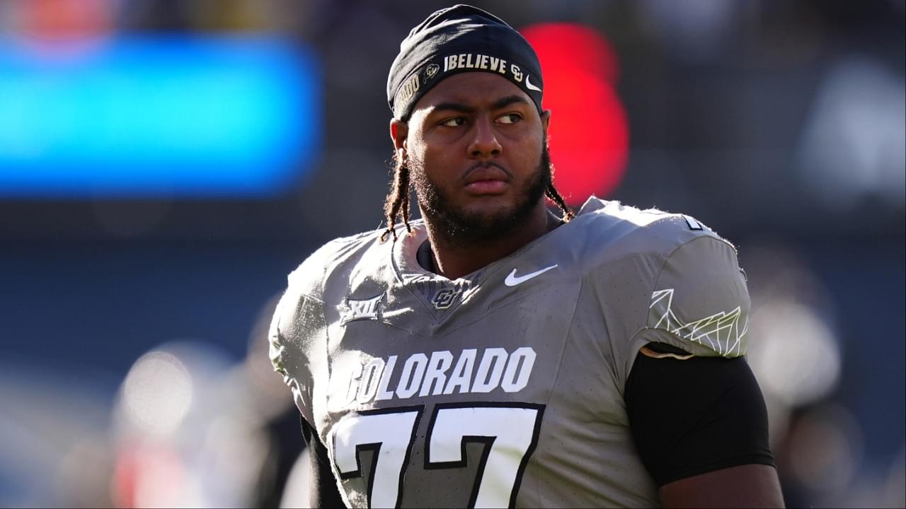 Colorado Buffaloes offensive tackle Jordan Seaton (77) looks on before the game against the Utah Utes at Folsom Field.