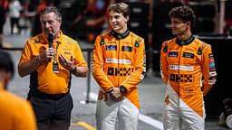 F1 Grand Prix Of Singapore Zak Brown, Team Principal of McLaren F1 Team, Oscar Piastri of McLaren F1 Team MCL38, and Lando Norris of McLaren F1 Team MCL38 pose for a portrait