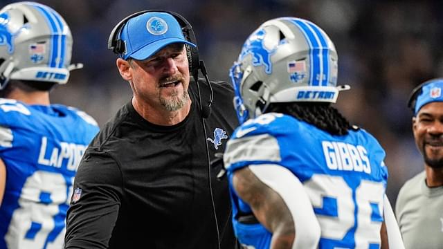 Detroit Lions head coach Dan Campbell shakes hands with running back Jahmyr Gibbs (26) after Sam LaPorta's touchdown against Tennessee Titans during the first half at Ford Field in Detroit on Sunday, Oct. 27, 2024.