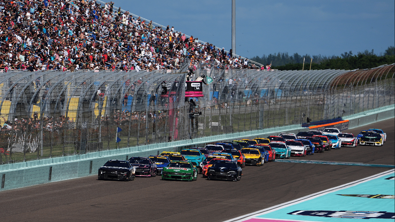 NASCAR Cup Series driver Kyle Busch (8) and NASCAR Cup Series driver Joey Logano (22) lead the field to restart the Straight Talk Wireless 400 at Homestead-Miami Speedway.