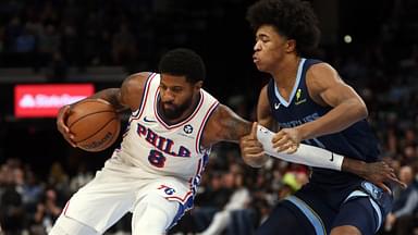 Philadelphia 76ers forward Paul George (8) drives to the basket as Memphis Grizzlies forward Jaylen Wells (0) defends during the first half at FedExForum.