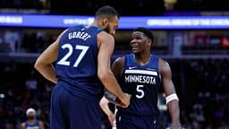 Minnesota Timberwolves center Rudy Gobert (27) reacts with guard Anthony Edwards (5) during the first half of an NBA game against the Chicago Bulls at United Center.