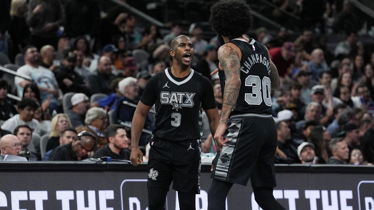 San Antonio Spurs guard Chris Paul (3) and forward Julian Champagnie (30) celebrate in the second half against the Oklahoma City Thunder at Frost Bank Center.