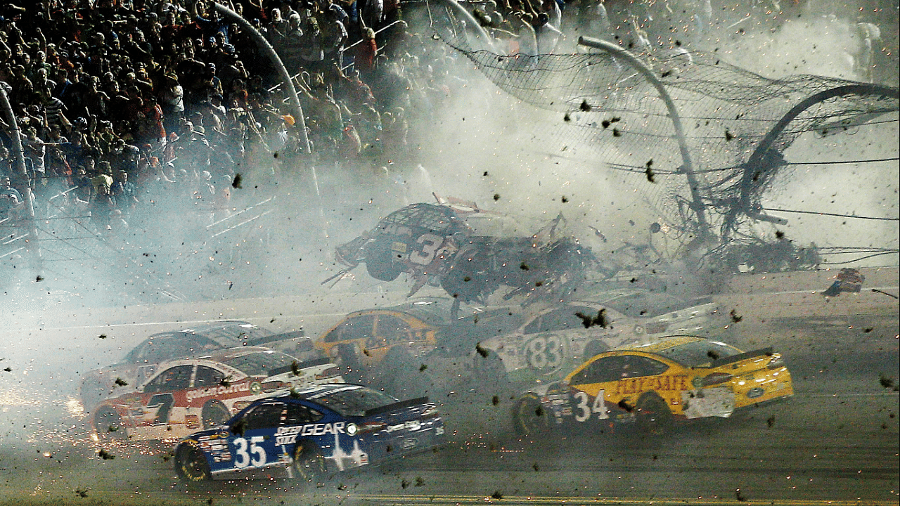 NASCAR Sprint Cup Series driver Austin Dillon car (3) crashes against the catch fence during the finish of the Coke Zero 400 at Daytona International Speedway.