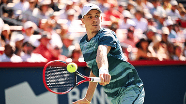 Denis Shapovalov (CAN) returns the ball to Brandon Nakashima (USA) (not pictured) in first round play at IGA Stadium.