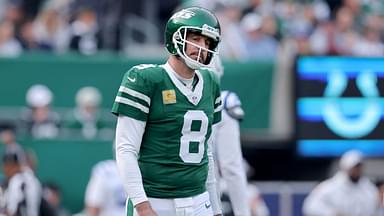 New York Jets quarterback Aaron Rodgers (8) reacts during the first quarter against the Indianapolis Colts at MetLife Stadium.