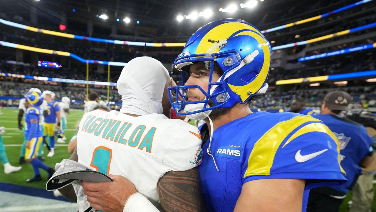 Miami Dolphins quarterback Tua Tagovailoa (1) and Los Angeles Rams quarterback Matthew Stafford (9) shake hands after the game at SoFi Stadium.