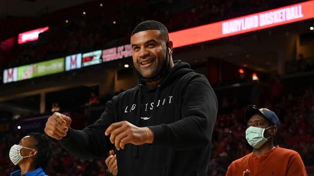 Shawne Merriman, former NFL and Maryland Terrapins linebacker, is recognized on the court for his charity Lights On Foundation's during the second half of the game against the George Washington Colonials at Xfinity Center.