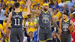 Golden State Warriors center DeMarcus Cousins (0) celebrates with Golden State Warriors guard Klay Thompson (11) during the first quarter against the Toronto Raptors in game six of the 2019 NBA Finals at Oracle Arena.