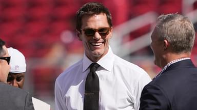 Oct 6, 2024; Santa Clara, California, USA; Fox color commentator Tom Brady (center) talks with San Francisco 49ers CEO Jed York (left) and general manager John Lynch (right) before the game against the Arizona Cardinals at Levi's Stadium.