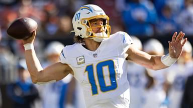 Nov 3, 2024; Cleveland, Ohio, USA; Los Angeles Chargers quarterback Justin Herbert (10) throws the ball against the Cleveland Browns during the second quarter at Huntington Bank Field.