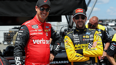 NASCAR Cup Series driver Joey Logano (left) and driver Ryan Blaney chat during practice and qualifying for the HighPoint.com 400 at Pocono Raceway.