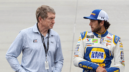 NASCAR Cup Series driver Chase Elliott (right) stands with his father and former driver Bill Elliott (left) prior to the AAA Drive for Autism at Dover International Speedway.