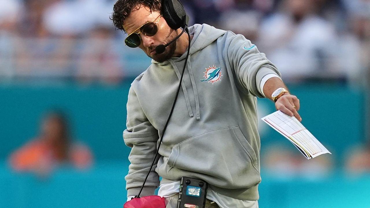 Miami Dolphins head coach Mike McDaniel walks on the field during the second half against the New England Patriots at Hard Rock Stadium.