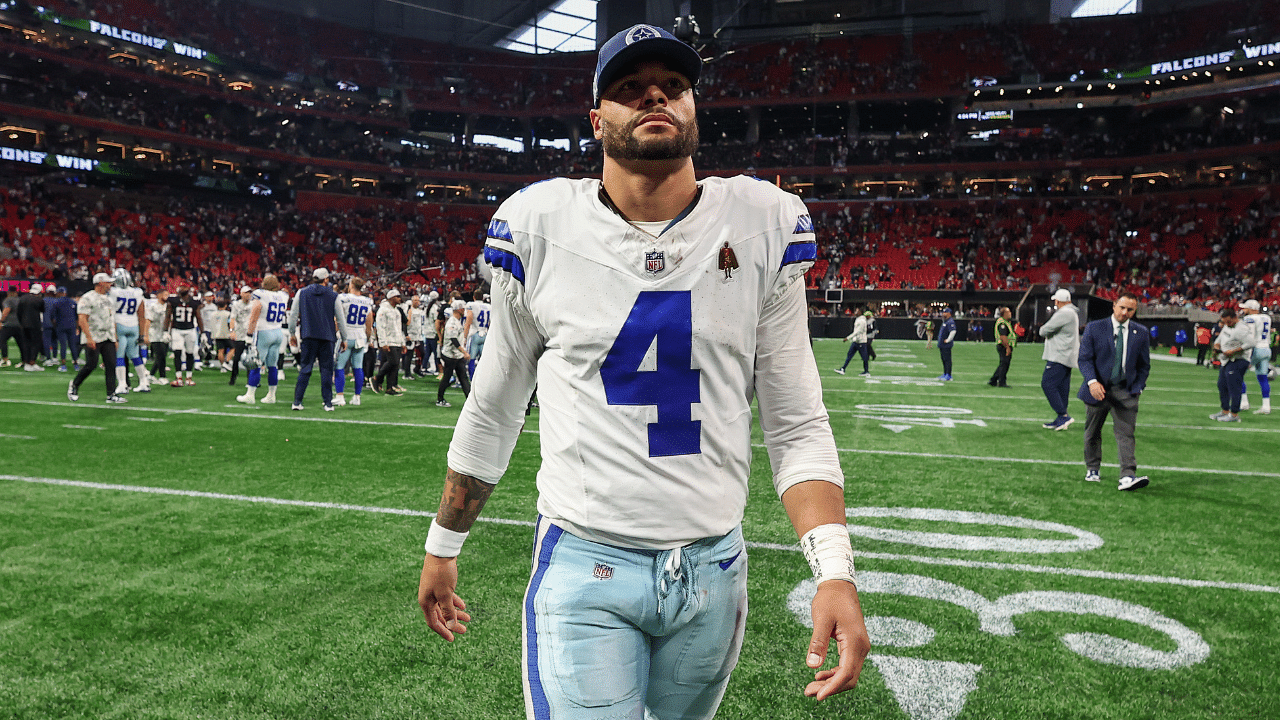 Dallas Cowboys quarterback Dak Prescott (4) walks off the field after a game against the Atlanta Falcons at Mercedes-Benz Stadium.