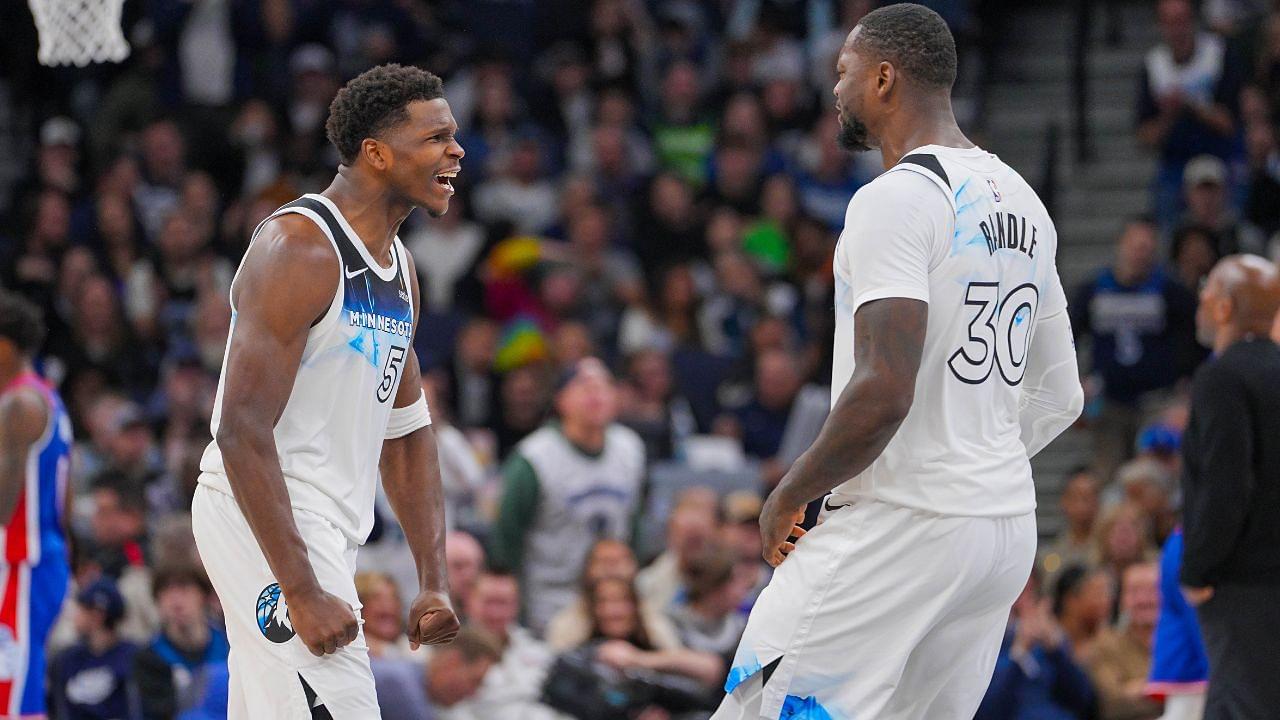 Minnesota Timberwolves guard Anthony Edwards (5) and forward Julius Randle (30) celebrate against the Sacramento Kings in the fourth quarter at Target Center.