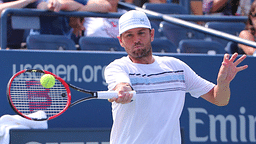 Mardy Fish of the United States returns a shot to Feliciano Lopez of Spain on day three of the 2015 U.S. Open tennis tournamen