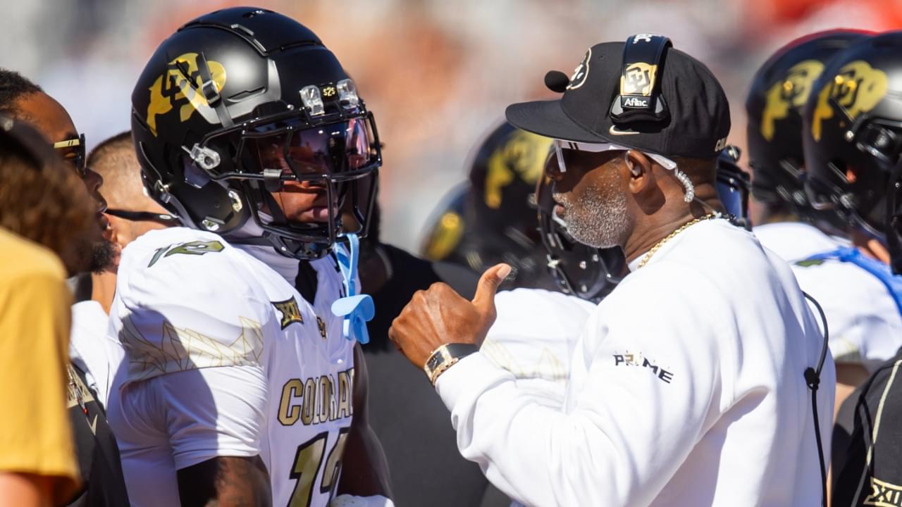 Oct 19, 2024; Tucson, Arizona, USA; Colorado Buffalos wide receiver Travis Hunter (12) with head coach Deion Sanders against the Arizona Wildcats at Arizona Stadium.