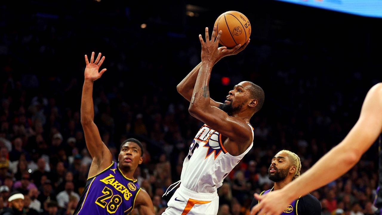 Phoenix Suns forward Kevin Durant (35) shoots the ball against Los Angeles Lakers forward Rui Hachimura (28) during the second half at Footprint Center.