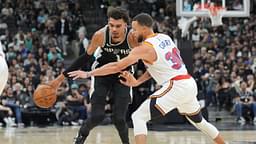 San Antonio Spurs center Victor Wembanyama (1) dribbles against Golden State Warriors guard Stephen Curry (30) in the first half at Frost Bank Center.